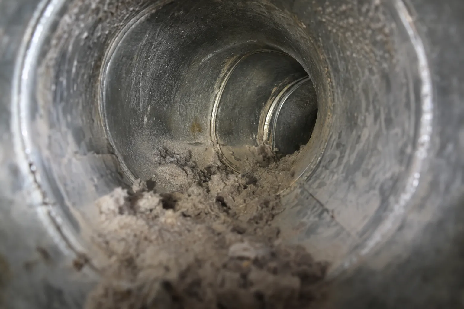 Lint built up inside a rigid metal dryer duct